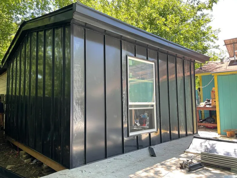 Black standing seam metal wall panels for Metal Roof Installation in Pittston